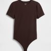 Body tipo tanga con camiseta de punto cerrado Body tipo tanga con camiseta de punto cerrado