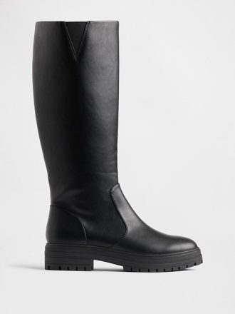 Botas altas con suela de tacos de cuero vegano