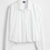 Camisa con dobladillo abullonado Camisa con dobladillo abullonado