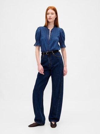 Camisa con volantes y pinzas
