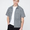 Camisa de popelina con bolsillo y cremallera completa