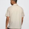 Camisa de popelina con ojales