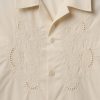 Camisa de popelina con ojales