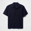 Camisa de popelina con ojales