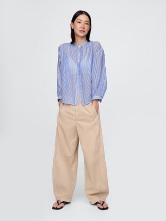 Camisa transparente con botones al frente