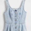 Camiseta de tirantes vaquera con peplum Camiseta de tirantes vaquera con peplum