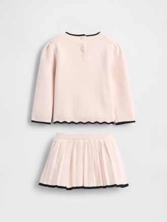 Conjunto de falda pantalón con suéter y lazo para bebé