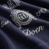 Gap × DÔEN Sudadera con capucha raglán con logotipo de peso pesado para adultos
