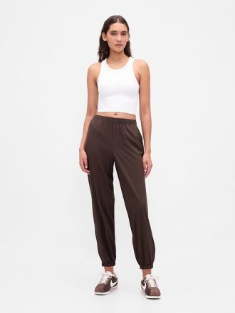 Pantalones deportivos de tiro alto con cremallera y dobladillo GapFit Tech