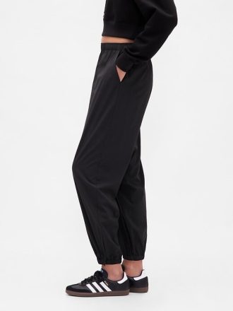 Pantalones deportivos de tiro alto con cremallera y dobladillo GapFit Tech