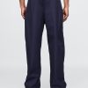 Pantalones holgados de paracaídas de sarga