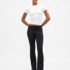 Pantalones largos y ajustados de sarga de tiro bajo
