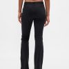 Pantalones largos y ajustados de sarga de tiro bajo