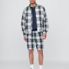 Shorts holgados plisados  de 9.5″ de Gap × Malbon