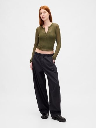 Suéter Henley de canalé transparente