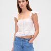 Top corto con peplum de gasa y volantes de encaje Top corto con peplum de gasa y volantes de encaje