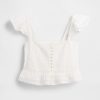 Top corto con peplum de gasa y volantes de encaje Top corto con peplum de gasa y volantes de encaje
