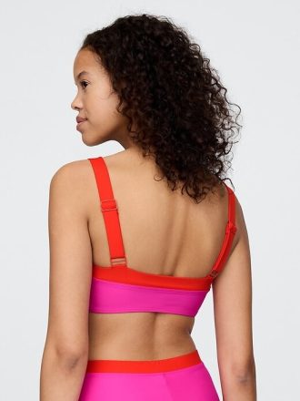 Top de bikini bandeau con bloques de color