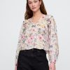 Top floral con ribete de volantes