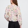 Top floral con ribete de volantes