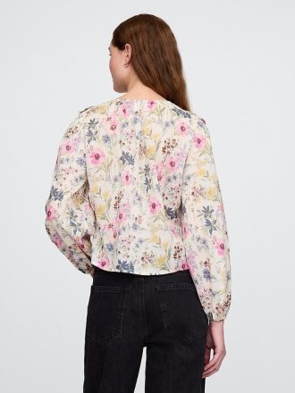 Top floral con ribete de volantes