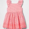Vestido con ojales para bebés y niños pequeños