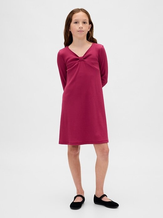 Vestido infantil con lazo y canalé Vestido infantil con lazo y canalé