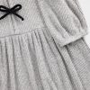 Vestido infantil de canalé suave con lazo en la parte delantera