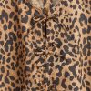 Vestido infantil de popelina con mangas abullonadas y estampado de leopardo Vestido infantil de popelina con mangas abullonadas y estampado de leopardo